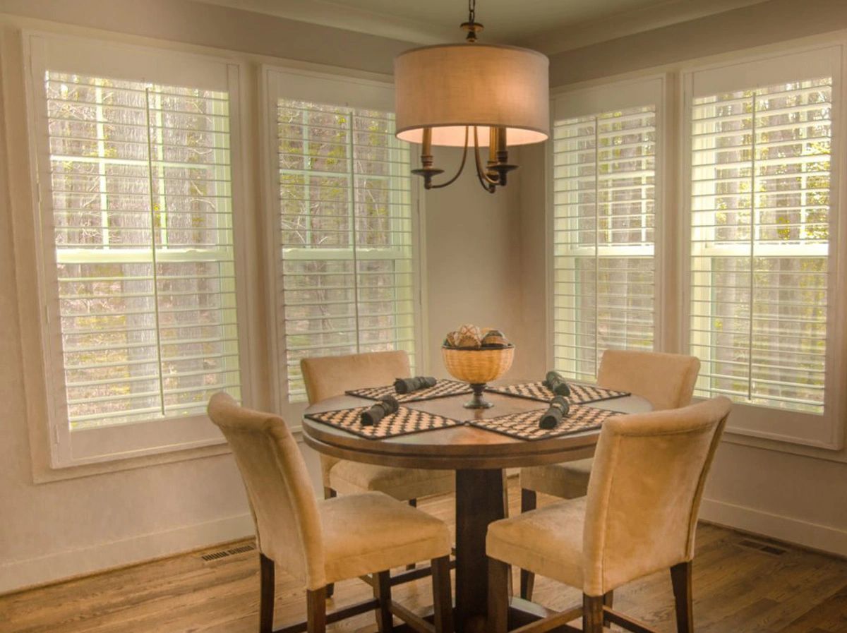 Elegant dining room with plantation shutters