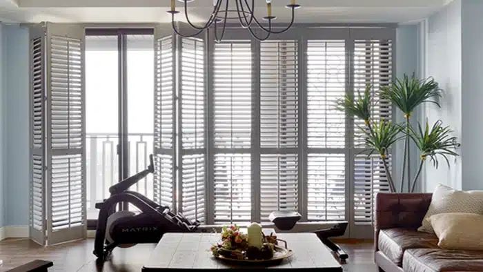 Interior plantation shutters on a bright window